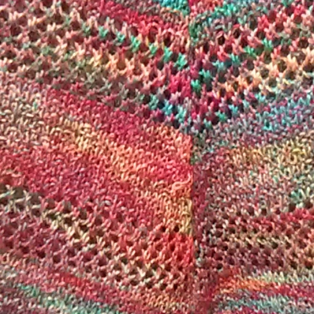 Multicolored short sleeved swing style sweater
